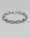 A handsome linked design, intricately textured in sterling silver. From the Royal Cord Collection Sterling silver Clasp closure About 8½ long Imported 