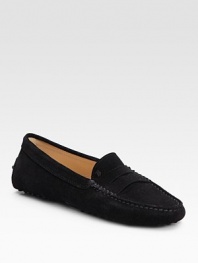 Ultra-soft suede with traditional moccasin-inspired details and a rubber sole for added traction. Suede upper Leather lining Rubber sole Padded insole Made in ItalyOUR FIT MODEL RECOMMENDS ordering one half size up as this style runs small. 