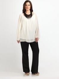 A heavenly silk design featuring delicate dolman sleeves, sophisticated embroidery, and an out-of-this-world fit.Gathered details at necklineDolman sleevesRelaxed fitPull-on styleEmbroidered detailsCurved hemAbout 29 from shoulder to hemSilkDry cleanImported