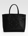 Store your necessities in this breezy nylon carryall, finished with the iconic Tory Burch logo for a signature look.Double top handles, 7½ drop Magnetic top closure Protective metal feet One inside zip pocket Two inside open pockets Cotton lining 16W X 13½H X 4D Imported