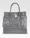 Glazed croc-embossed leather, cinched at the sides and finished with polished hardware.Double top handles, 5 drop Chain and leather shoulder strap, 11 drop Magnetic top closure Protective metal feet One inside zip pocket Four inside open pockets Logo-print lining 14W X 13H X 4½D Imported