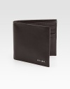 Smooth leather design with logo detailing.One bill compartmentEight card slots3¾W x 4¼HMade in Italy