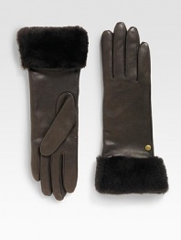 Durable deerskin leather accented with luxurious cashmere lining and shearling sheepskin cuff.Metal logo detailAbout 11 longSpecialist dry cleanImportedFur origin: Spain
