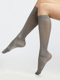 These semi-sheer socks feature a soft metallic sheen. Solid cuffFlat toe seam94% polyamide/6% elastaneMachine washImported 