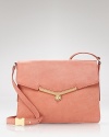 Botkier gives the ladylike shoulder bag a playful twist with pastel leather and a turn lock closure. Worn with denim or dresses, this blushy bag hints and girlie chic.