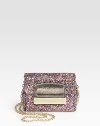 Dazzling mini flap-front design of glitter-drenched leather.Detachable chain shoulder strap, 24 dropFlap over zip closureOne inside open pocketFully lined5W X 4H X 2DMade in Italy