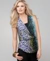 Style&co.'s vibrant petite top features a bold print and a stylish blouson-style fit thanks to a built-in waistband.