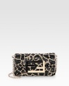 Chic leopard-print jacquard, softly-pleated in a flap-front bag, finished with logo hardware.Detachable shoulder strap, 22½ dropMagnetic snap flap closureOne inside open pocketCotton lining9W X 6H X 2DMade in Italy
