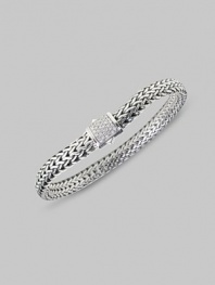 Substantial sterling links are accented with a clasp of delicate pavé diamonds. Diamond, 0.17 tcw Sterling silver 7½ long Spring lock closure Made in Bali