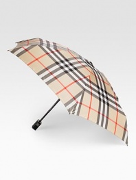 Medium-sized umbrella in classic check with automatic open and close button. Open diameter, about 40 Folded length, about 9 100% polyester Imported 