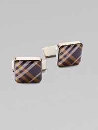 Set a new sartorial standard with polished links that feature the iconic check design. Brass/enamel½ x ½Imported
