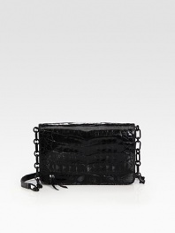 A timelessly chic design in beautiful crocodile, features a removable strap to convert it to a crossbody bag.Removable leather and chain strap, 22½ drop Magnetic flap closure One outside open pocket Two inside zip pockets Two inside open pockets Six credit card slots Leather lining 7½W X 5H X 1½D Imported