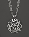 A bold sterling silver pendant featuring a cluster of hearts on a triple-chain necklace. From Fifth Season by Roberto Coin.