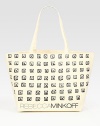 Printed studs lend a hand-crafted look to this roomy canvas carryall.Shoulder straps, 10½ drop14W X 13H X 7¾DImported