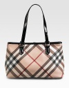A multi-use carryall in classic check with shiny patent trim. Shoulder strap, 7½ drop Zip closure One inner zip and two open pockets Nylon lining 14W X 9H X 5½D PVC Imported