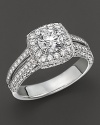 A beautiful split-shank diamond ring in 18K white gold.
