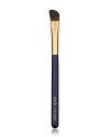 Angled brush sweeps on powder eyeshadow for allover base application plus definition on the outer lid and crease.