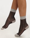 A luxurious, striped design with contrast toe, ankle and leg band. Ribbed leg bandFlat toe seamSilkHand washMade in Italy 