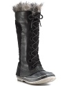 Stylish snow boots with a duck boot sole, lace-up styling and fringe detail. A unique look to sport on the slopes.