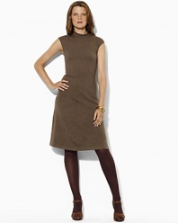 The quintessential sweater dress is jersey-knit in extra-fine merino wool and finished with a rolled neckline and flirty cap sleeves for season-spanning style.