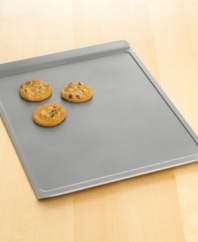 Bake a sizable batch of gooey chocolate chip or moist oatmeal raisin cookies with this large cookie sheet. Features include nonstick interiors and exteriors for easy cleaning, no-hassle food release and optimum baking performance. Large cookie sheet pictured on bottom. Lifetime warranty.