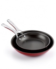 Cook with confidence-always have a bold approach to prep and cooking with the statement red of these professional skillets. Porcelain enamel exteriors with a heavy-gauge constructions aide in fast heat-up and eliminate hot spots that can burn food. Food slides right off the nonstick interiors, which are exceptionally long-lasting and durable, so you can spend less time at the sink and more time cooking up masterpiece creations. Limited lifetime warranty.