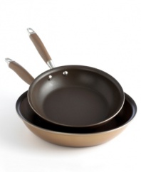 Heat up any stovetop with performance and style. Anolon's dynamic duo of skillets is crafted in bronze-hued, hard-anodized aluminum and finished with an exclusive nonstick coating for healthier meal preparation done with sumptuous style. Limited lifetime warranty.