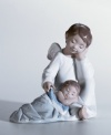 Let someone know they have a special friend looking after them! This sweet and adorable figurine makes a wonderful gift for a new mom. Crafted of fine porcelain with delicate painted hues and a high-gloss finish. Measures 7.5 x 4.75.