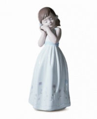 Let your favorite little girl know she's a true princess in your eyes! This simply pretty figurine makes a wonderful gift. Crafted of fine porcelain with delicate painted hues and a high-gloss finish. Measures 7.25 x 3.25.