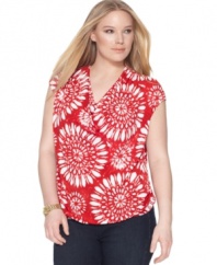 Revamp your casual look this season with MICHAEL Michael Kors' cap sleeve plus size top, showcasing a bold print-- it's an Everyday Value!