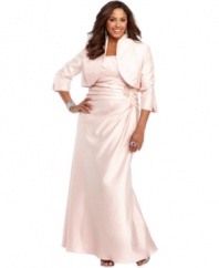 Jessica Howard's plus size evening gown is adorned with a pleated, bead-embellished waistline and complemented by a cropped jacket with three-quarter sleeves.