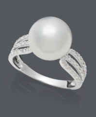 Polish and prestige. This luminous ring by Belle de Mer epitomizes elegance with a cultured freshwater pearl center (10-11 mm) surrounded by three rows of sparkling, round-cut diamonds (1/4 ct. t.w.). Setting crafted in 14k white gold.