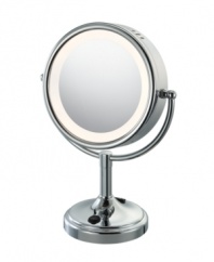 Put some light on the subject. This double-sided vanity mirror offers an enlightened view with a touch-control light along the mirror's circular rim.