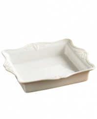 This pristine white serveware features a gently scalloped rim and raised pattern of cascading vines. Perfect for casual dining or formal entertaining, this charming baker is sure to enhance mealtime at your home. Can go from freezer to oven! From Lenox's dinnerware and dishes collection. Qualifies for Rebate