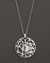 A bold sterling silver pendant glistening with faceted rock crystals. By Di MODOLO.