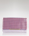 DIANE von FURSTENBERG's woven clutch is a cool-girl's after-hours accessory of choice. In a bold color way and oversized shape, it makes a statement worn with denim or dresses.