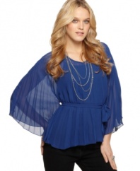 Gorgeous pleats unite and make an undeniable statement in this flowy chiffon blouse from Ali & Kris!