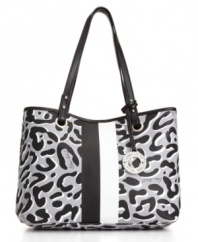Take a walk on the wild side with a fun spin on the leopard print trend. This Nine West tote features tonal animal print exterior with bold vertical stripe accents.