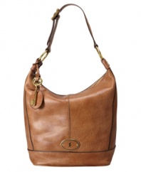 Get an urban-chic appeal with this easy-going hobo by Fossil. Goldtone hardware and vintage-inspired lock and key accents give this style an irresistible charm.