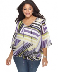 Enliven your casual look with AGB's butterfly sleeve plus size top, featuring a bold graphic print.