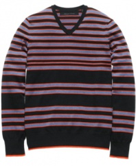 Stripe it rich in your seasonal wardrobe with this bold sweater from Sean John.
