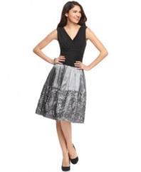 A ruched bodice and ribbon embellishments at the skirt make this petite SL Fashions dress as full of fun as it is filled with dashing design details.