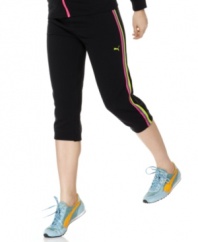 Kick up your workout wardrobe with these Puma active pants, featuring a shock of color at the outer seams.