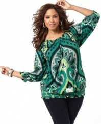 Be a bold bohemian beauty with INC's three-quarter sleeve plus size peasant top, flaunting an Ikat print. (Clearance)
