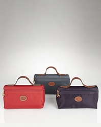 A sleek and stylish nylon cosmetic pouch from Longchamp.