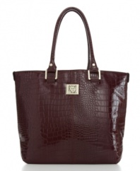 Available in rich raspberry or sleek black, this croc-embossed patent tote from AK Anne Klein may be the perfect weekend bag: stylish and roomy.