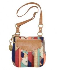 A dose of color mixed with a boho vibe makes this unique organizer by Fossil a must-see design. Aged goldtone hardware and a cool patchwork exterior gives this eye-catching bag just the right look.