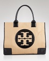 Give your on-vacation style a designer upgrade with this straw tote from Tory Burch. Here, patent trims lend this roomy beach bag glossy good looks.