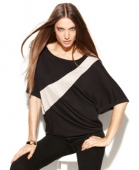 INC ups the ante on a fluid-draped petite top with colorblocking and sequins! A great day-to-night option.