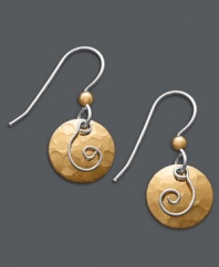 A complementary mix of metallics. Jody Coyote's whimsical drop earrings combine hammered bronze discs and beads with swirling sterling silver. Approximate drop: 1 inch.